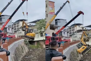 Не самая удачная установка экскаватора с помощью крана