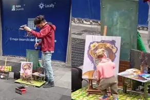 Художник рисует картины с помощью марионетки