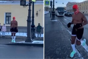 Смельчак в шортах пробежался по морозному Петербургу