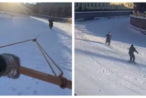 Заезд на сноуборде и мотоцикле по замёрзшему каналу в Питере