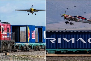 Впервые в мире: пилот садится на движущийся поезд и взлетает с него