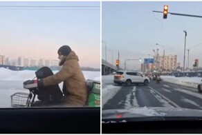 В Москве на Калужском шоссе заметили курьера-лихача, который ехал на электровелосипеде с ребёнком
