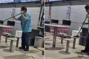 Владельца кафе раскритиковали за то, что он чистил столики метлой