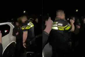 Полицейский  устал от спора и применил перцовый баллончик