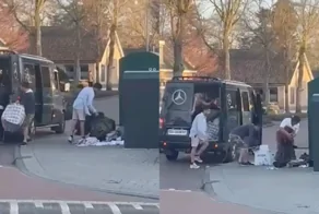 В Нидерландах разграбили контейнер с одеждой для нуждающихся