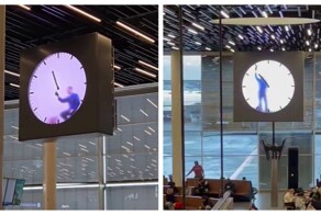 Необычные часы в аэропорту Амстердама