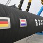 Истерика вокруг российского газа. Меркель едет к Путину