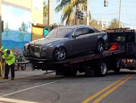 Rick Ross crashes car after gunshots fired