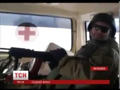 Каратели батальона «Донбасс»  на машинах с красным крестом!