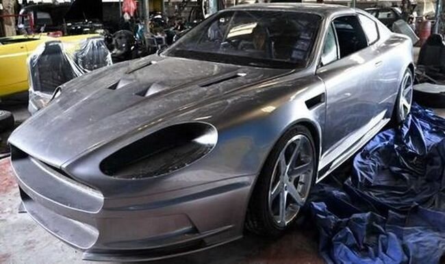 Aston Martin DB9? нет, это Opel Calibra