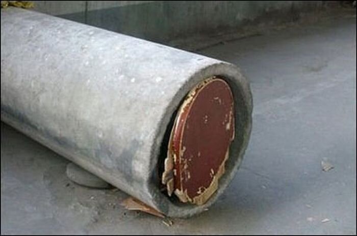 Китаец прожил в бетонной трубе почти год! (2 фото)