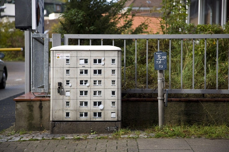 Painting Miniature Apartment Buildings around the City