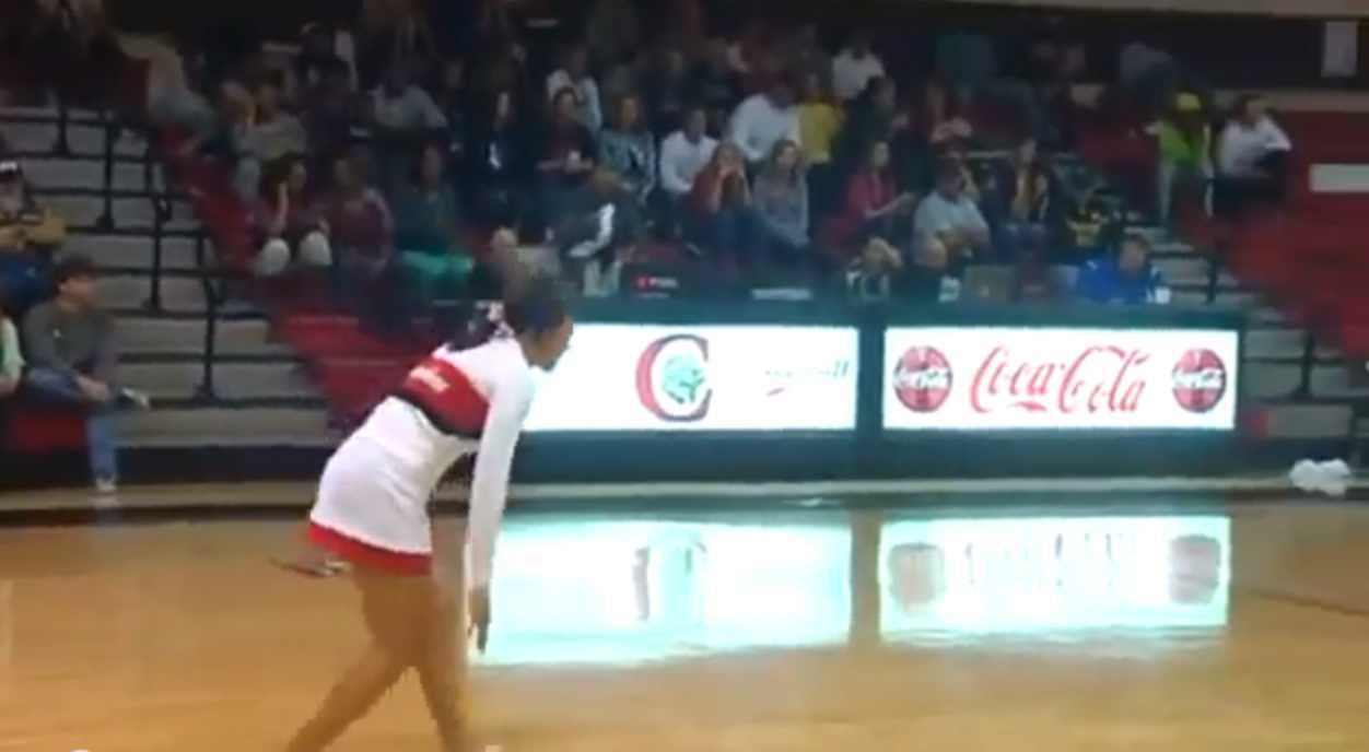 Cheerleader Hits Amazing Basketball Trick Shot