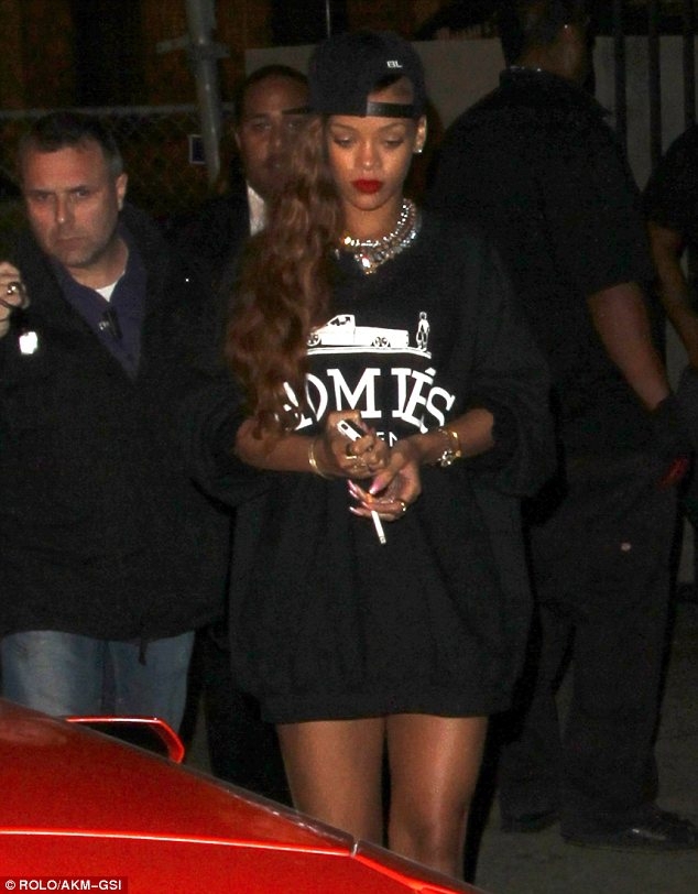 Rihanna heads to a club in just a jumper