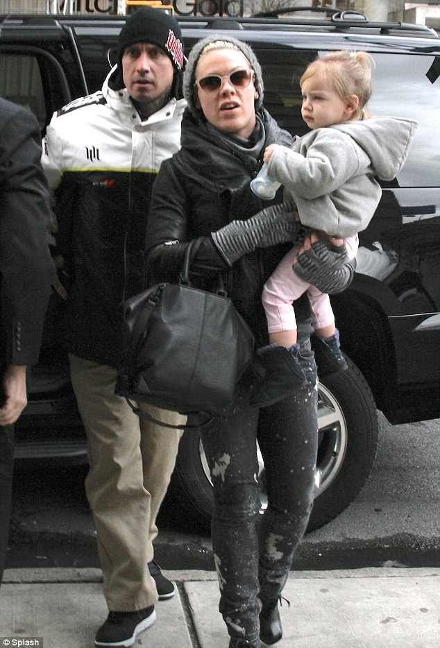 Pink and Carey Hart Take Turns Holding Daughter Willow
