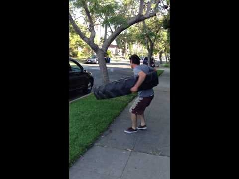 Paul “Dizzy Hips” Blair Uses 98-Pound Tractor Tire as Hula Hoop