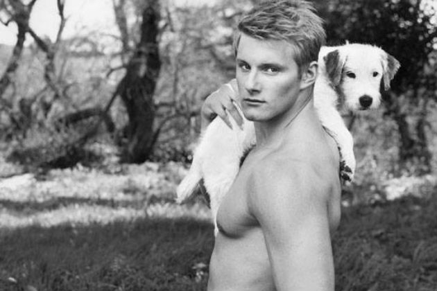 ‘Hunger Games’ Hottie Alexander Ludwig Poses Shirtless with a Puppy 
