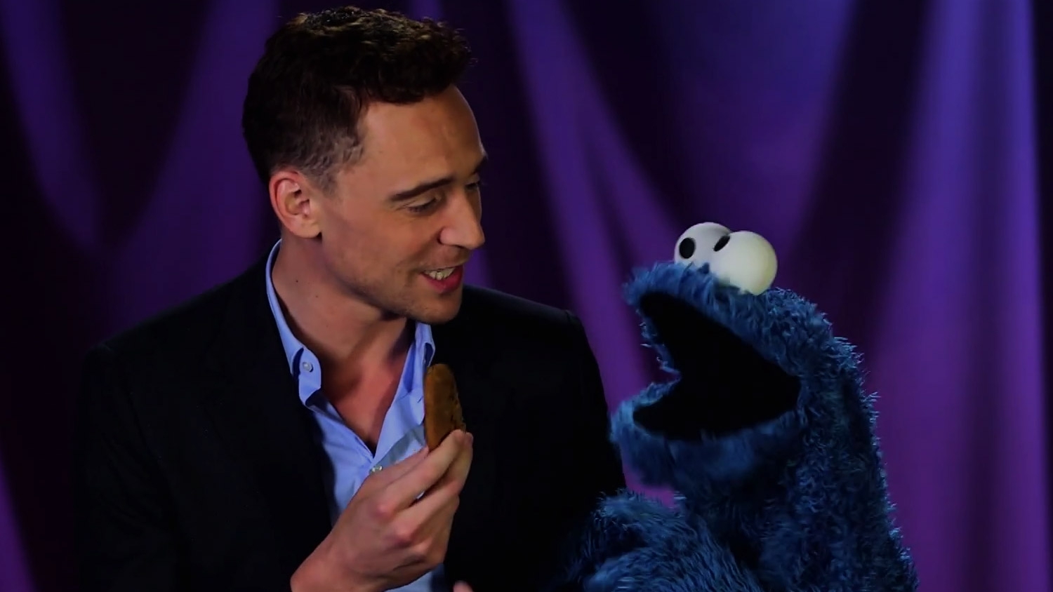 Tom Hiddleston Teaches Cookie Monster a Lesson 