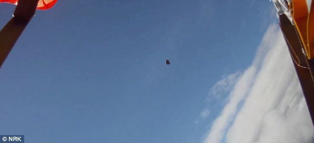 A skydiver is nearly hit by a falling METEORITE  