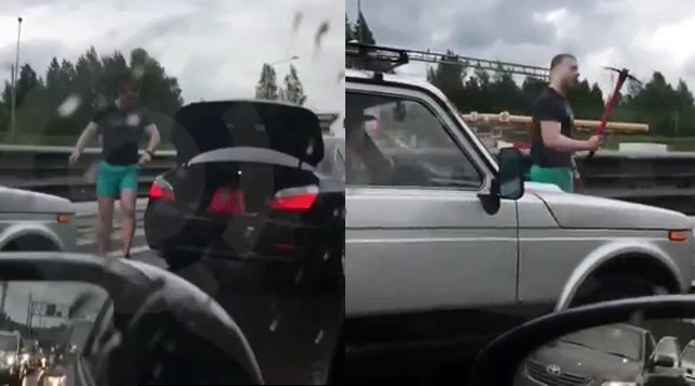 Автохам на BMW разбил стекло Нивы киркой