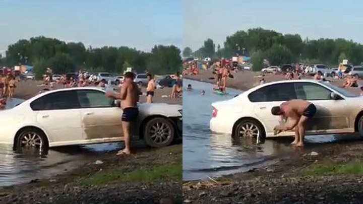 Красноярский автомобилист загнал машину в озеро и начал её мыть