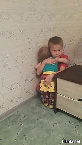 Старший сын стоит в углу (наказан), подходит младший сын и шепчет ему на ухо:...