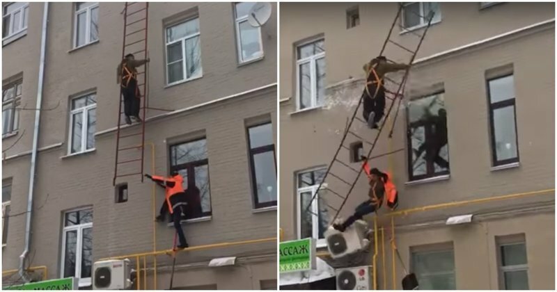 Падение рабочих с пожарной лестницы попало на видео