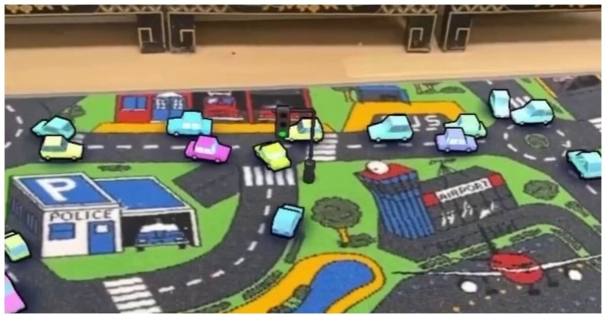 Машинки дополненной реальности на детском ковре с дорогами