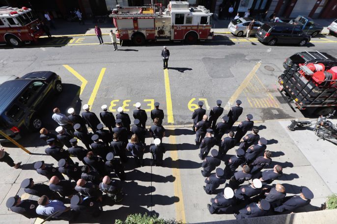 Policemen and Fireman gather 