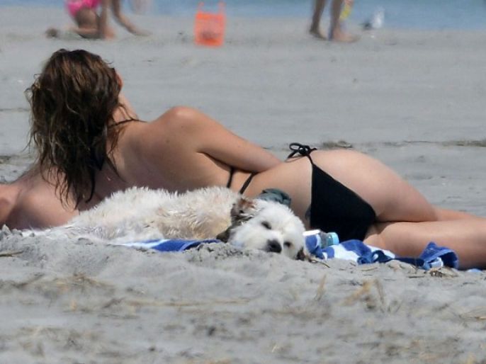 Olivia Wilde Laying with her pup 