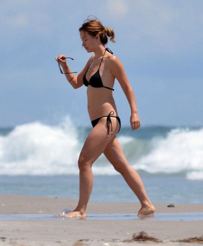 Olivia Wilde walks the beach 