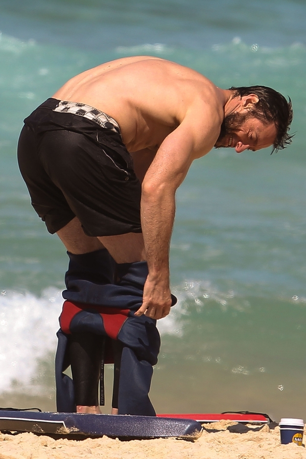Hugh Jackman Getting out of a wet suit 