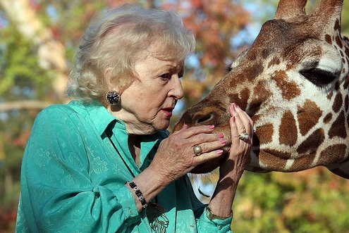 Betty White and Giraffe 