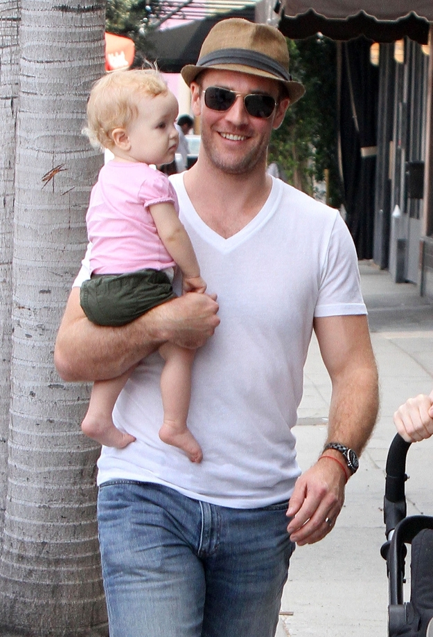 James Van Der Beek Holding a Baby 