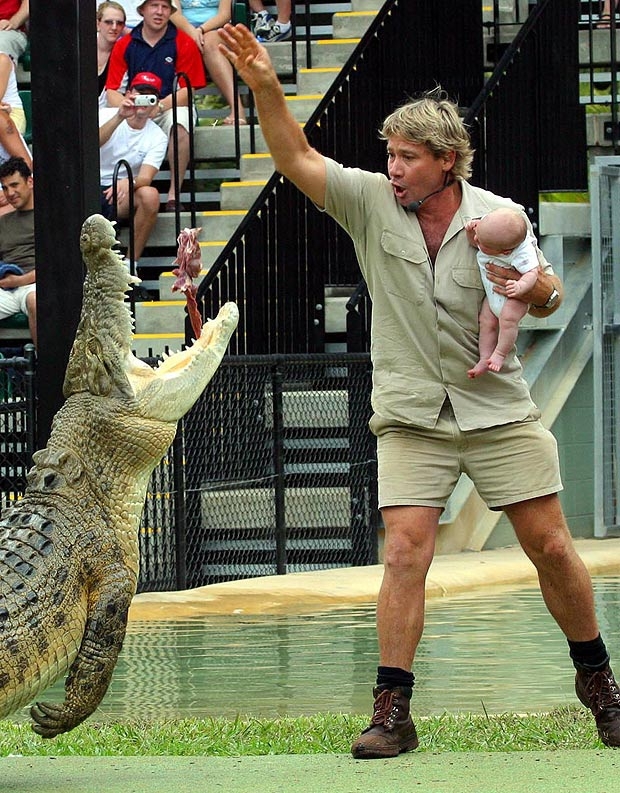 Steve Irwin Holding His Son Next To The Action 