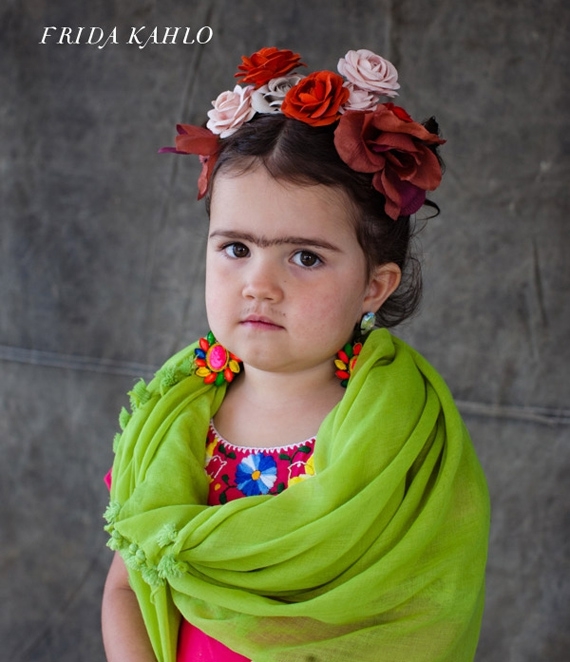 Tiny Frida Kahlo is not enjoying her unibrow. 