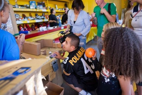 Kid builds an elaborate arcade out of cardboard boxes 