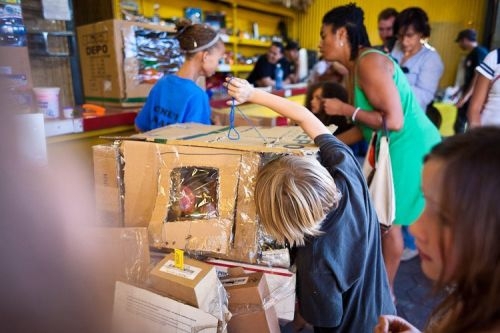 Kid builds an elaborate arcade out of cardboard boxes 