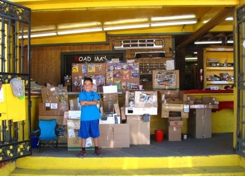 Kid builds an elaborate arcade out of cardboard boxes 