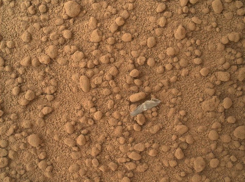 Curiosity Stars Taking Samples of Soil