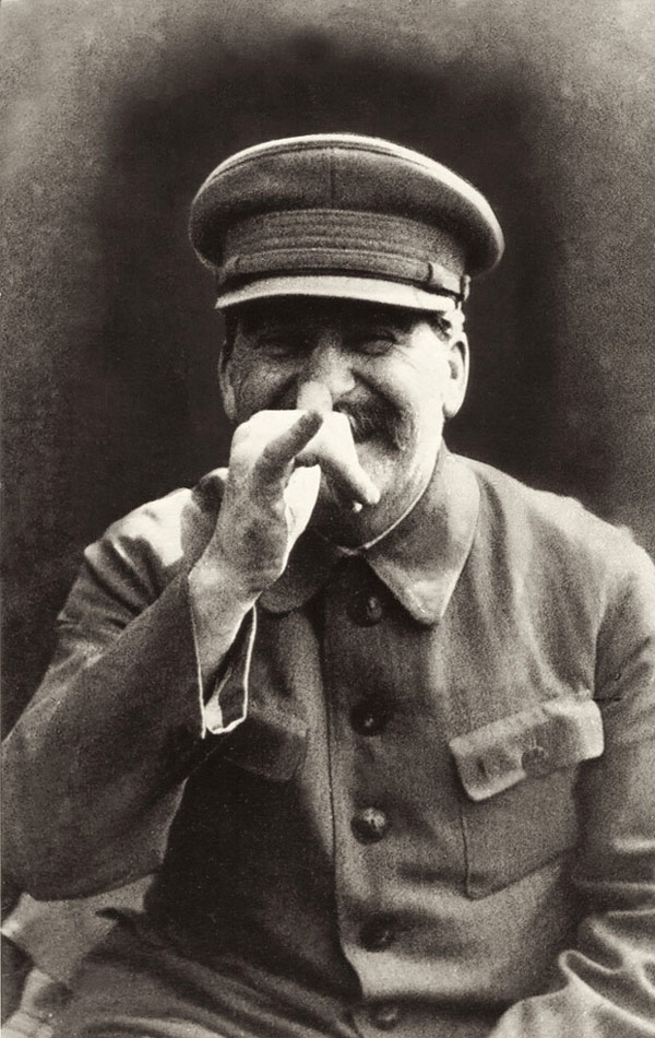 Joseph Stalin making a face at his bodyguard. Photo by Lt. Gen. Nikolai Vlasik, c. 1930
