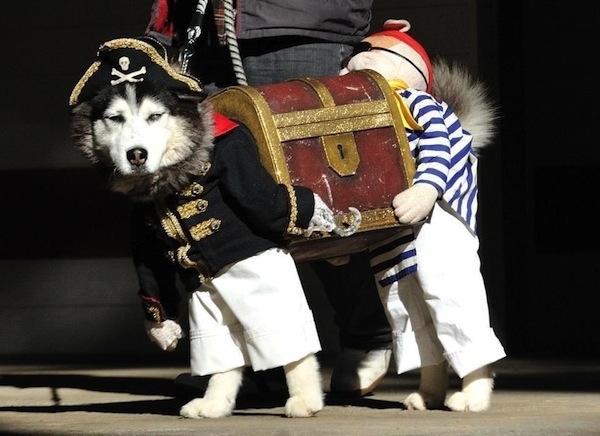 Two Pirates Carrying A Treasure Chest