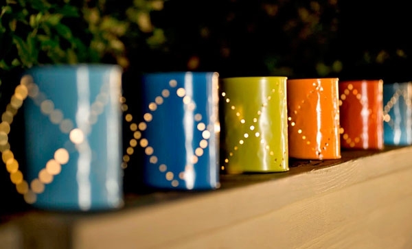 Punch painted cans and turn them into mini lights.
