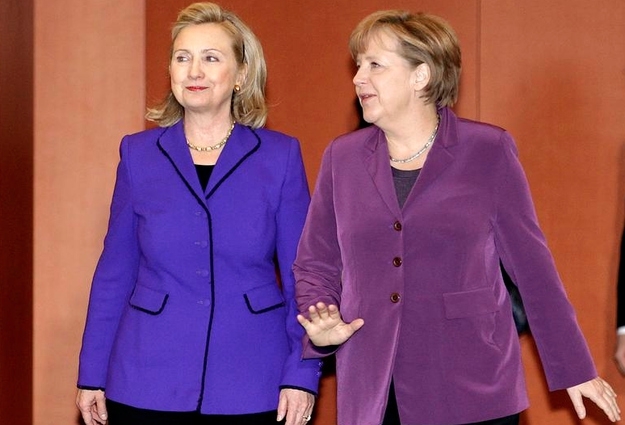 She looks better in purple than Angela Merkel does.