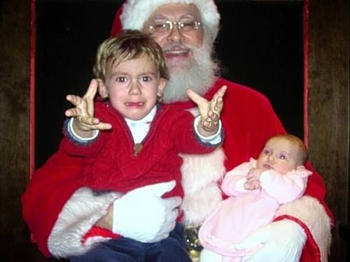 Festive Photos Of Santa Terrifying Children