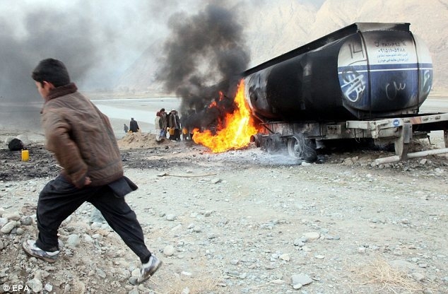 Taliban Siphon Off Fuel 