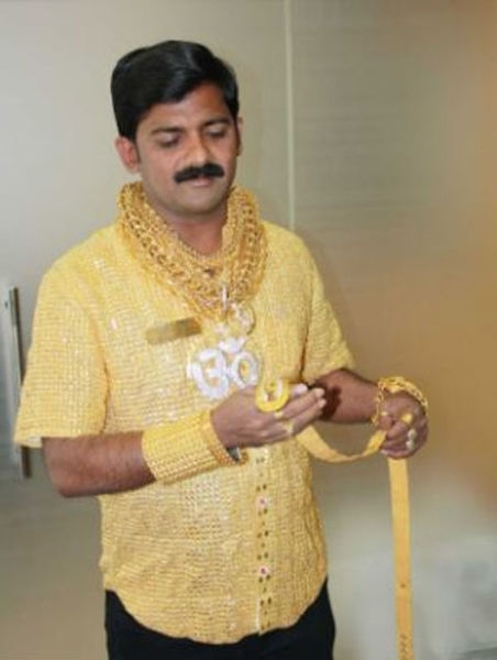 Wealthy Man Wears Golden Shirt to Get the Ladies 