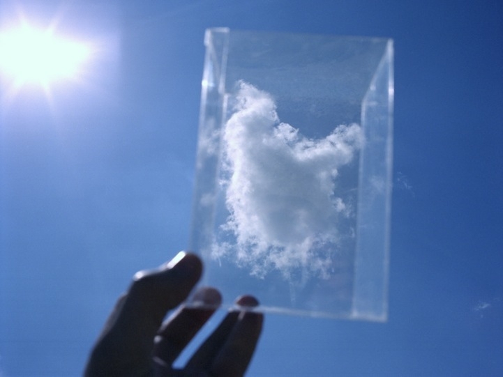 Photographer Captures Fluffy Clouds in Glass Boxes 