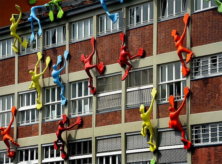 Giant Sticky Man Toys Climb German Buildings 