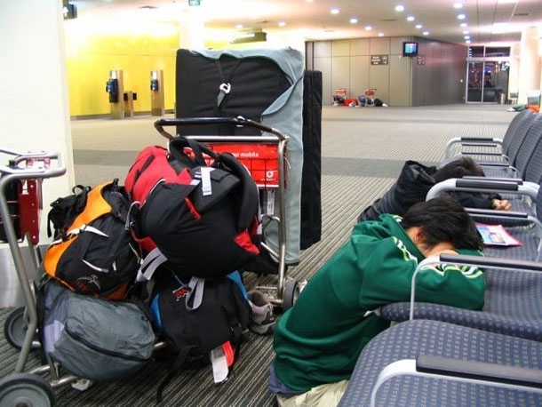 Awkward Sleeping Positions Of People At Airports